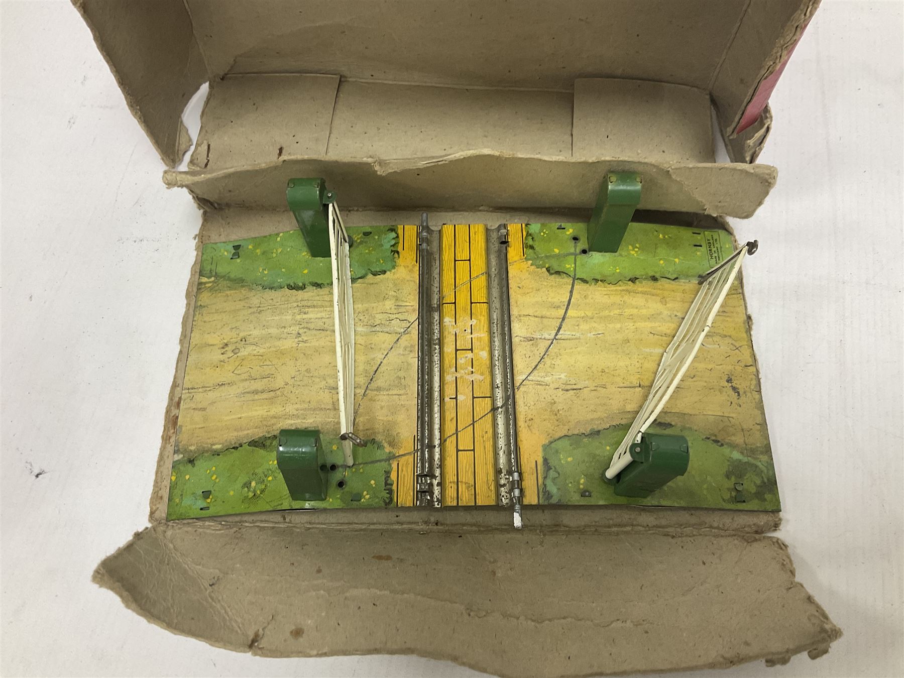 Hornby ‘0’ gauge - LNER 0-4-0 no.460 type 101 locomotive in green with key; further boxed ‘0’ gauge to include no.1 Crane Truck, no.2 single arm signals, open and closed goods wagons and cars; large quantity of track to include railway crossing, straight and curved track etc, in two boxes 