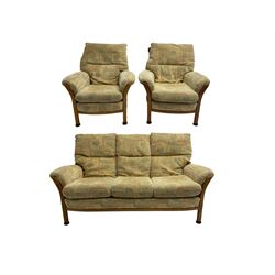 Mid-20th century beech framed three seat sofa (W1180cm) and pair of matching armchairs (W95cm) upholstered in neutral patterned fabric