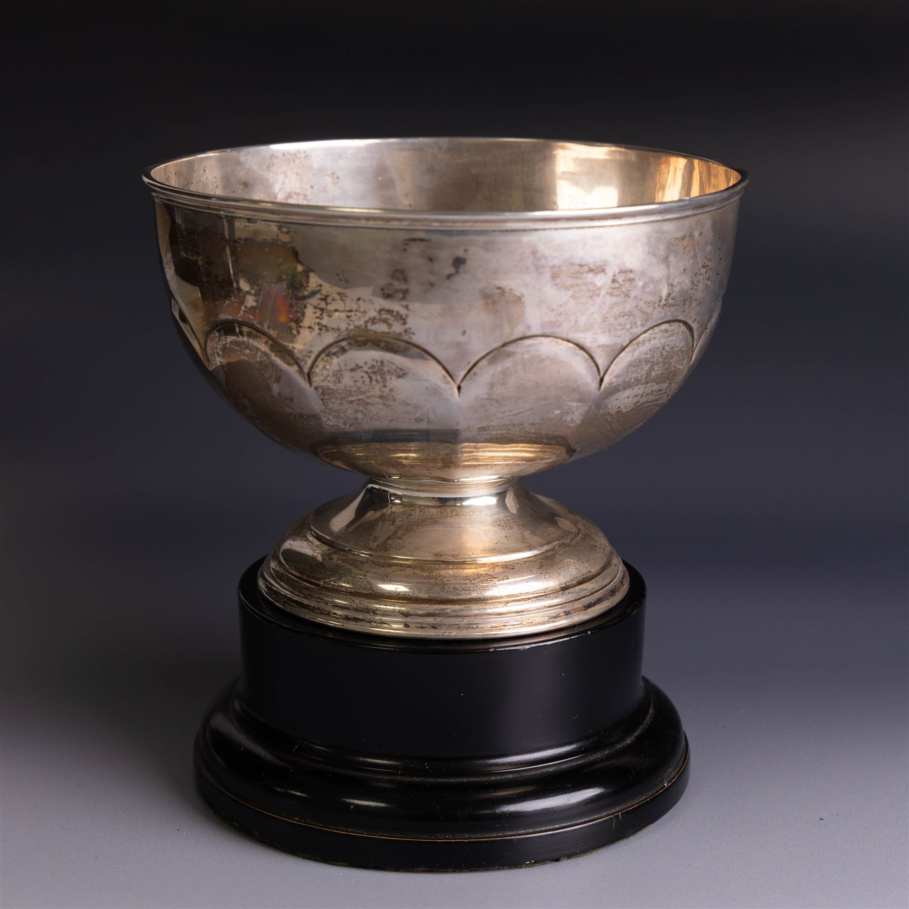 Edwardian silver pedestal bowl, of part fluted circular form, hallmarked Birmingham 1909, maker's marked worn and indistinct, upon an ebonised wooden pedestal, bowl H11.5cm