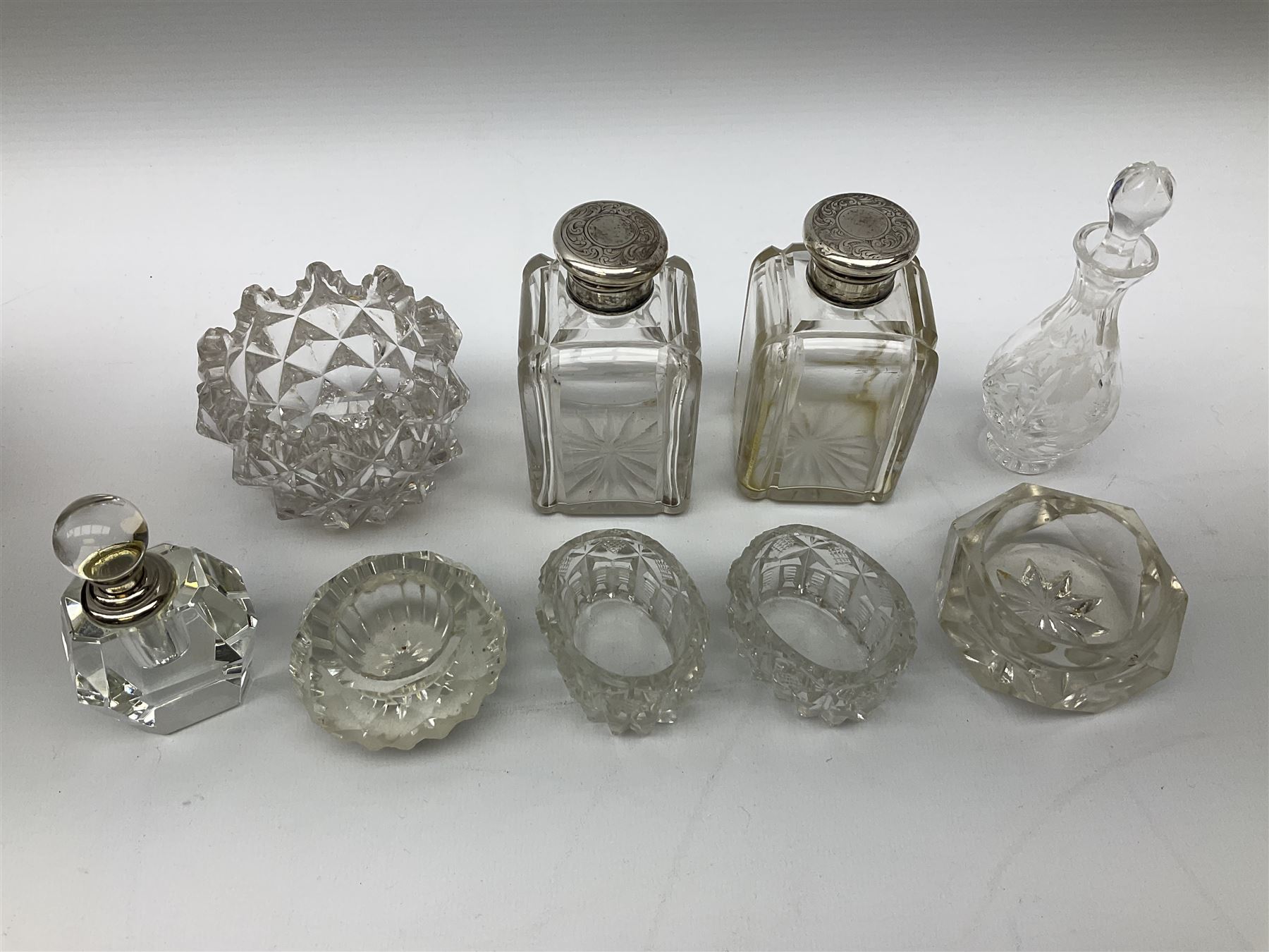 Pair of hobnail glass dressing table jars of cylindrical form with