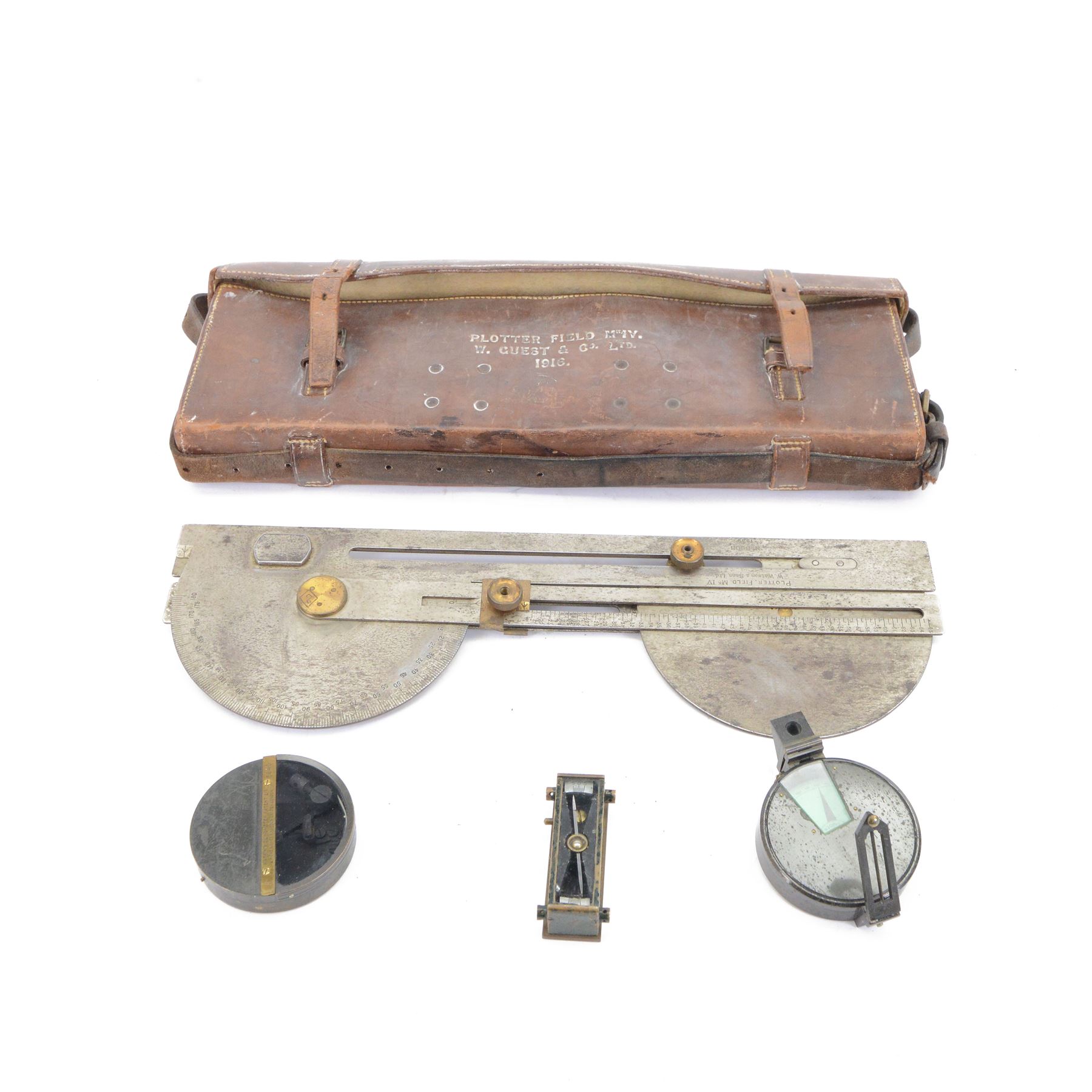 WWII British Plotting Field Instrument in Case, the metal instrument with ruled guide, used to calculate the fall of the shot from the gun stamped 'Plotter Field Mk IV W. Watson & Sons Ltd, No 8908 1939', in leather case marked 'Plotter Field MIV W. Guest & Co Ltd 1916', together with Watkin's compass clinometer, by J. Hicks, Hatton Garden, London, number 5640 and a trough compass 
