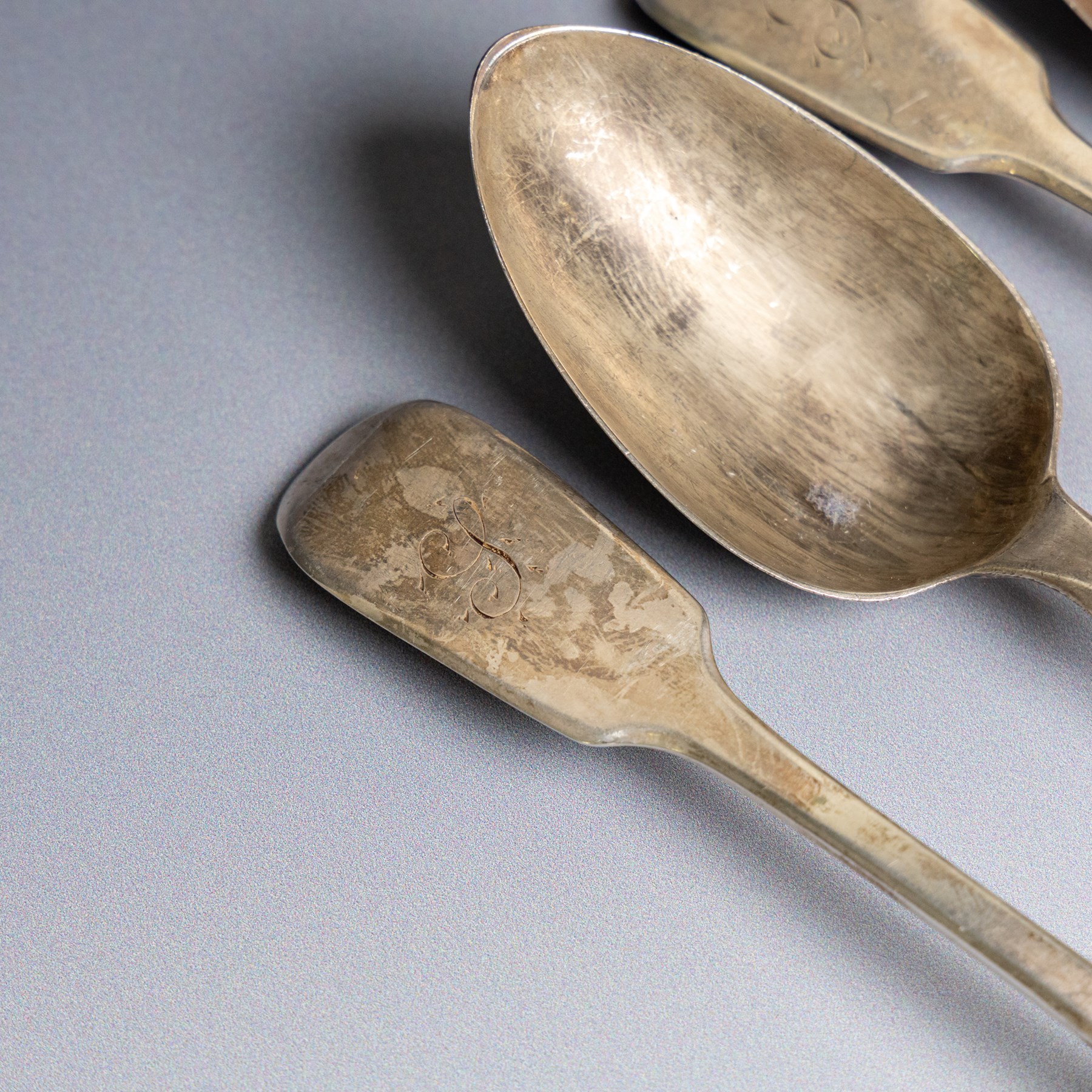 Collection of silver flatware, comprising set of six Georgian teaspoons, three Victorian Exeter silver dessert forks, Georgian Old English pattern table spoon, etc all hallmarked