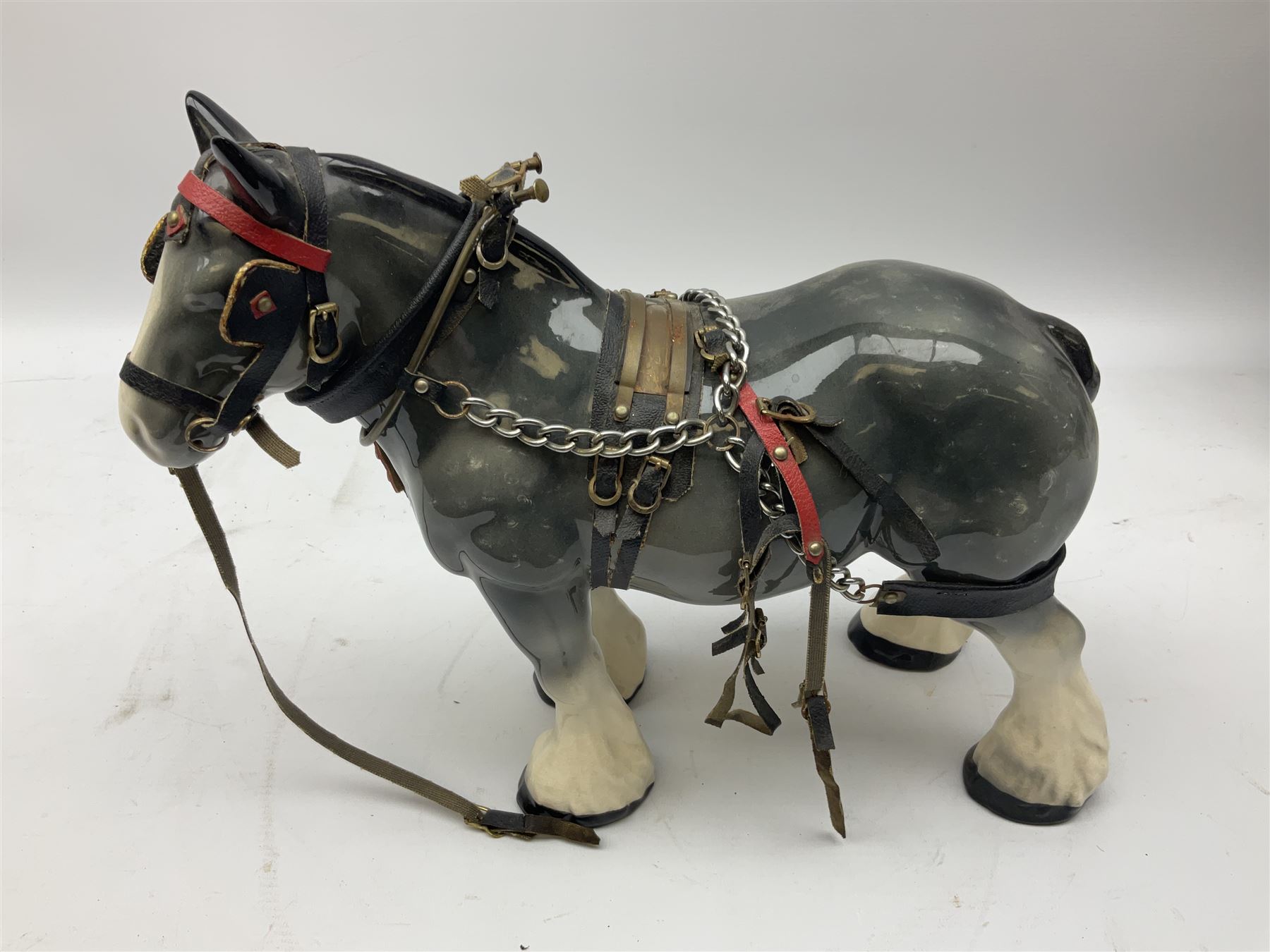 Four Melba Ware Shire horse figures and another similar, and three wood carts