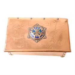  Arts & Crafts copper and enamel box, of rectangular form, the hinged lid with central enamel cabochon overlaid with pierced copper butterfly motif, raised on brass bun feet, H7cm, L17cm