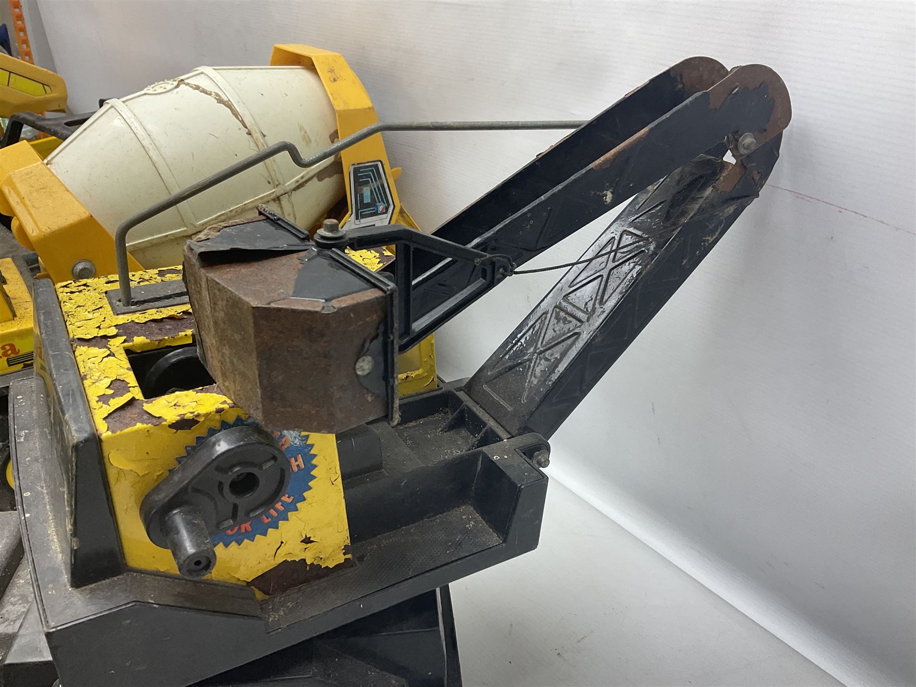 Tonka - five large scale pressed steel vehicles comprising Cement Mixer, Mighty Mobile Crane, Jeep and two Dumper Trucks (5)