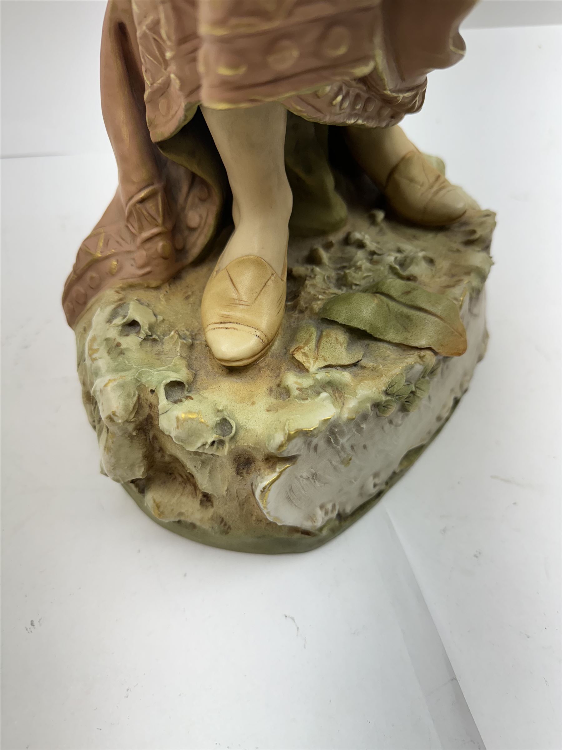 Royal Dux figure no. 686, modelled as a female water carrier, carrying two urns and wearing flowing green and pink robes, with applied pink triangle mark beneath, H61cm