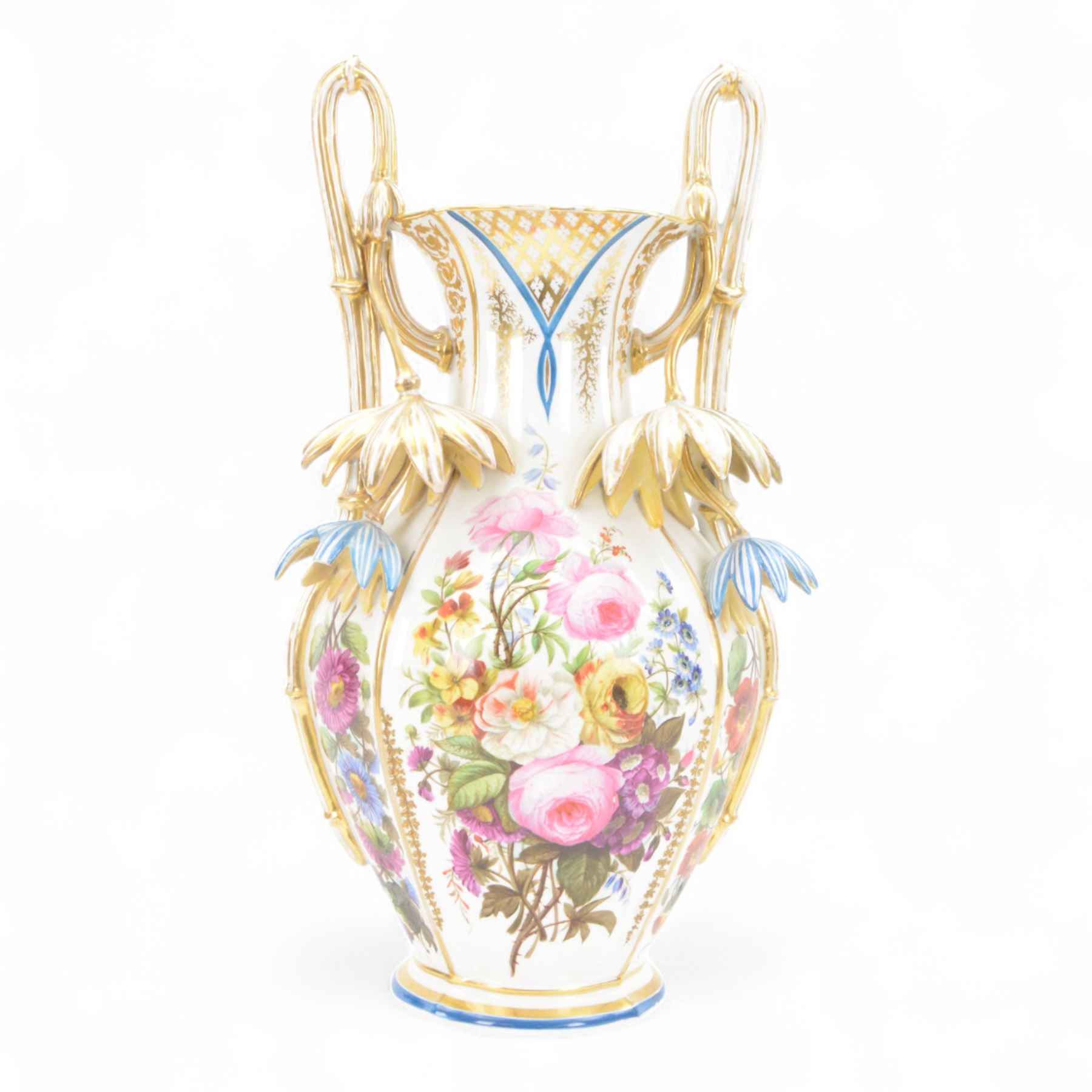 Large mid 19th century French porcelain vase, of baluster form with raised twin handles with applied stylised flower heads, the body painted with panels of pronounced floral sprays within blue and gilt borders, H58cm