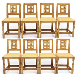 Mouseman - set of eight light oak dining chairs, each with lattice panel back and tan leat...
