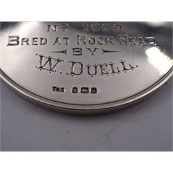 Edwardian silver medal, of circular form, embossed to front with a bay horse and inscribed Cleveland Bay Horse Society, engraved verso 1904 Egton Show won by Rock Dove No 1000 bred at Rock Head by W Duell, hallmarked Vaughton & Sons, Birmingham 1903, contained within fitted case, D6.3cm