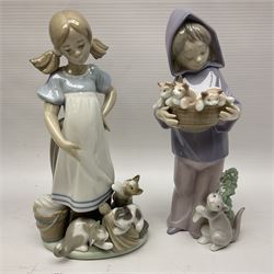 Five Lladro figures, including The Lamp Lighter no 5205,  Girl and Kittens no 6102, Cat no 5113 etc