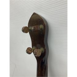 George Formby banjolele with metal plaque to headstock L55cm; in carrying case with instruction booklet.