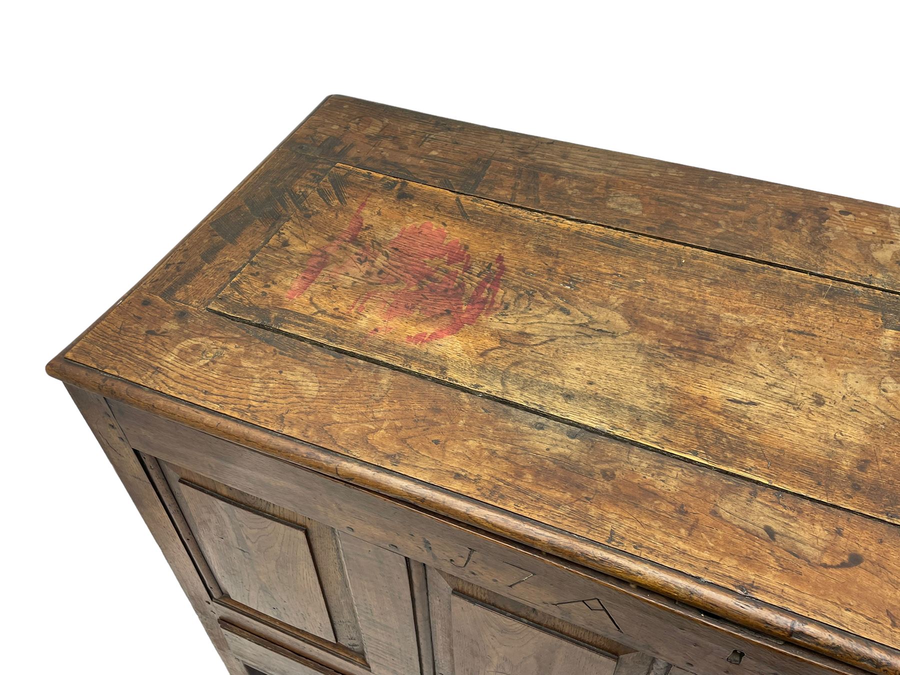 Georgian oak mule chest, moulded rectangular hinged lid over quadruple fielded panel front, the frieze inscribed '17 A Y 57', fitted with two drawers, panelled ends and back, on stile supports