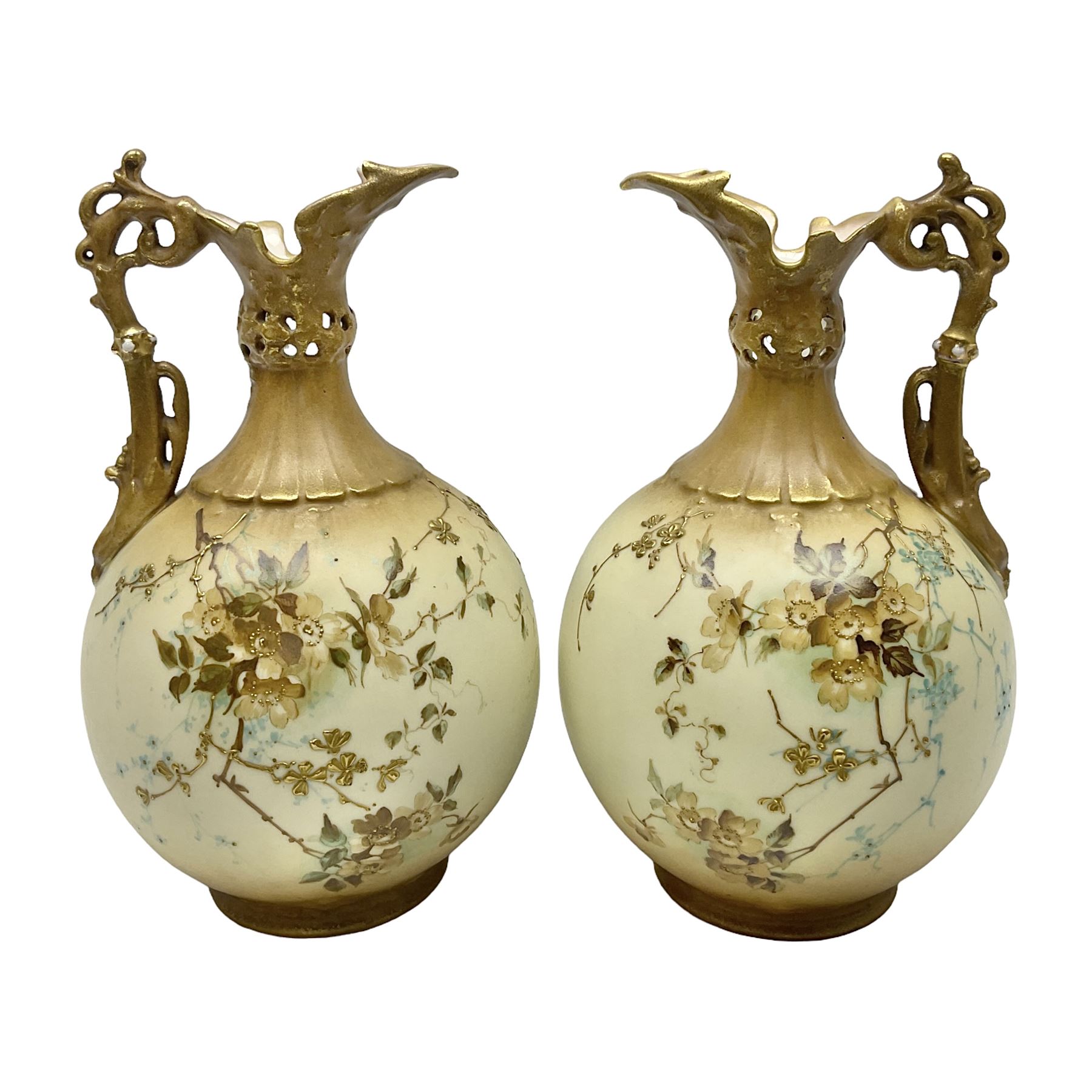 Pair of Turn Vienna blush ivory ewers decorated with floral sprays and gilt, H25cm