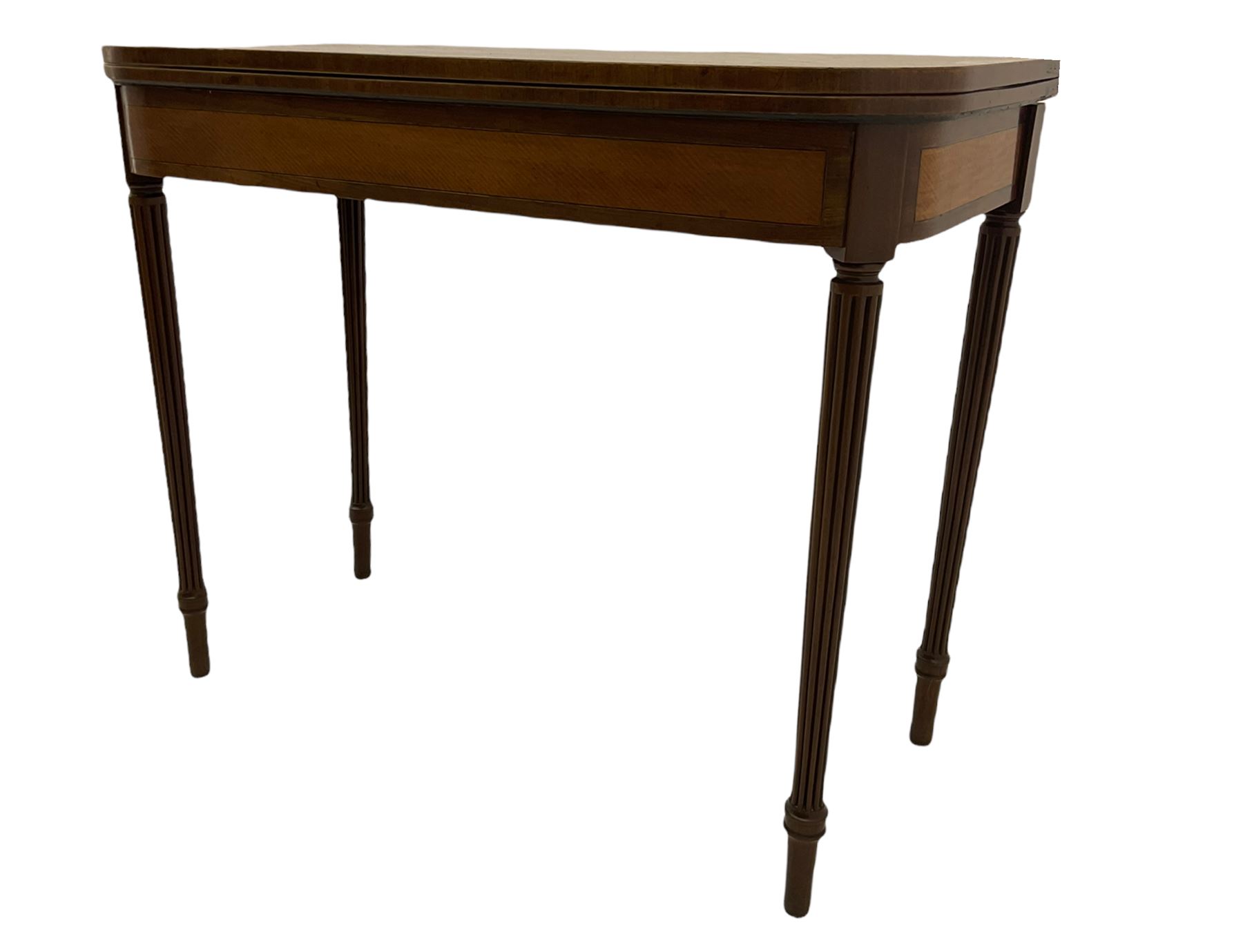 Early 19th century tea table, rectangular fold-over top with rounded corners, the frieze and sides inlaid with satinwood panels, double gate-leg action base, on reeded supports 