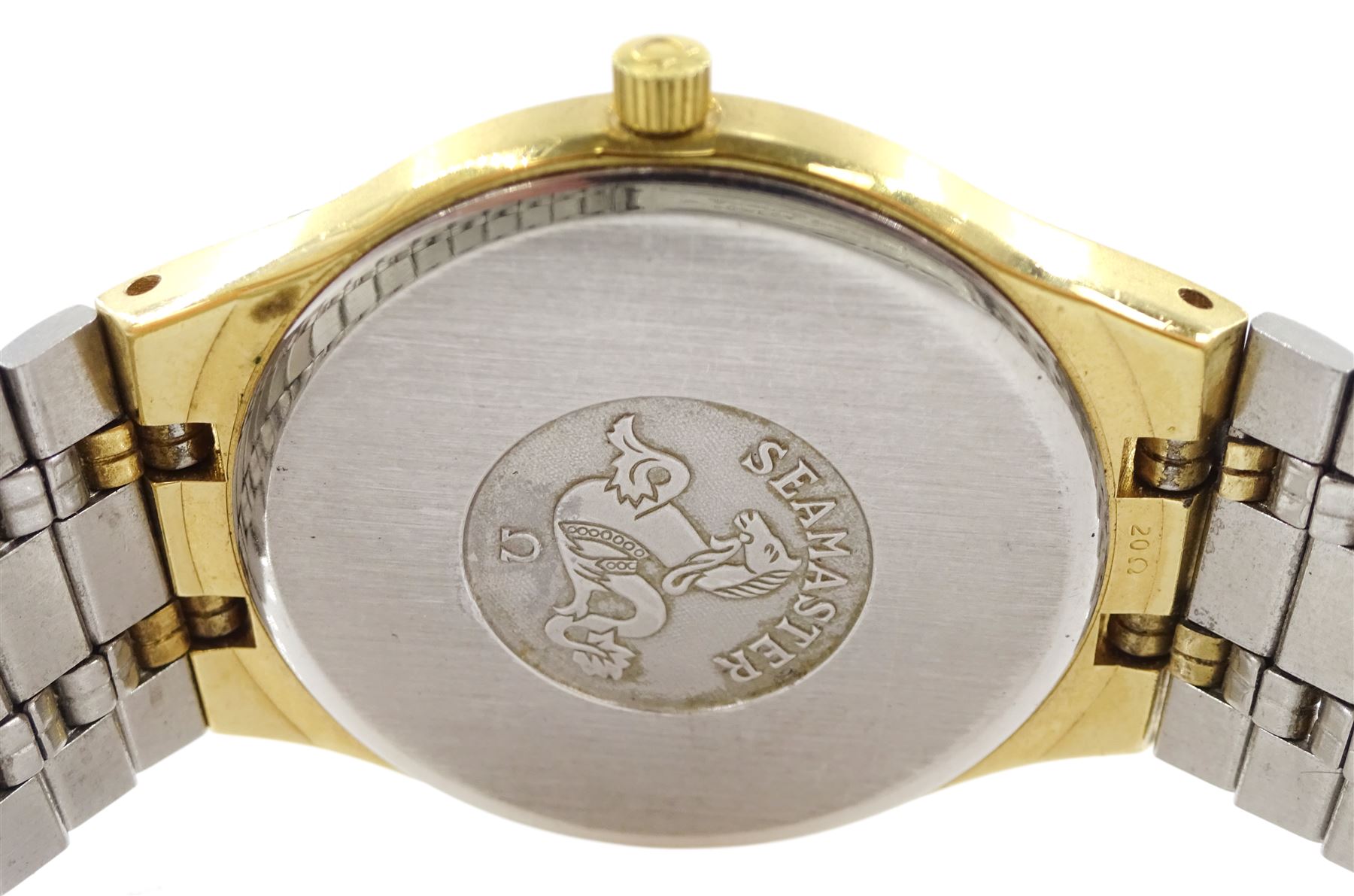 Omega gentleman's gold-plated and stainless steel quartz wristwatch, 196 0235, champagne dial with baton hour markers and date aperture, on original Omega gold-plated bracelet, with fold-over clasp