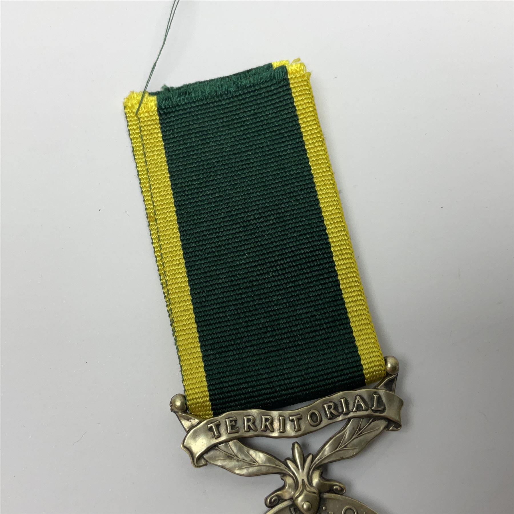 Territorial Efficiency Medal awarded to 2036048 Spr F.A. Furnell R.E.; Territorial Force Efficiency Medal; and Army Emergency Reserve Decoration; all with ribbons (3)