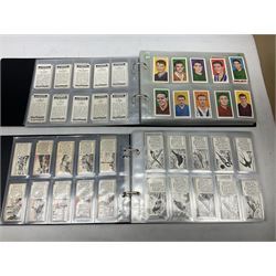 Quantity of trade cards, housed in ring binder albums and loose, including Twinnings, Lyons, PG Tips, Hornimans, Ty-Phoo etc and various unused official paper albums, in two boxes