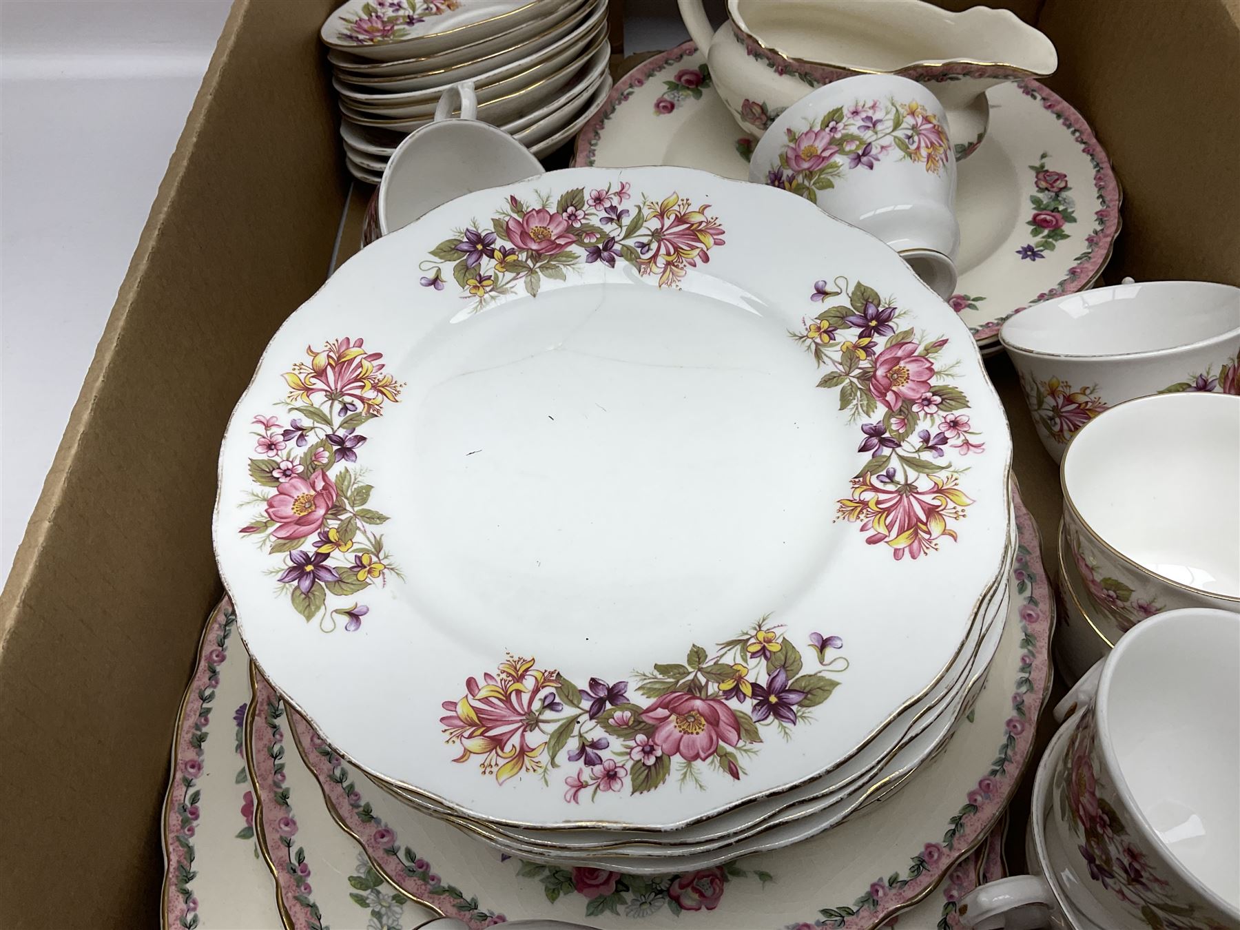 Royal Staffordshire Dinnerware by Clarice Cliff Nancy pattern dinner wares, including sauce boat, dinner plates, side plate and serving platter, together with a collection of Colclough Wayside Honeysuckle pattern tea wares