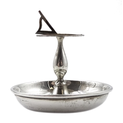 Edwardian silver bridge trumps marker, in the form of a garden sundial with bowl base and ivorine dial by Britton, Gould & Co, Birmingham 1907 and a silver desk calendar with ivorine date panels by Sydney & Co, Birmingham 1919