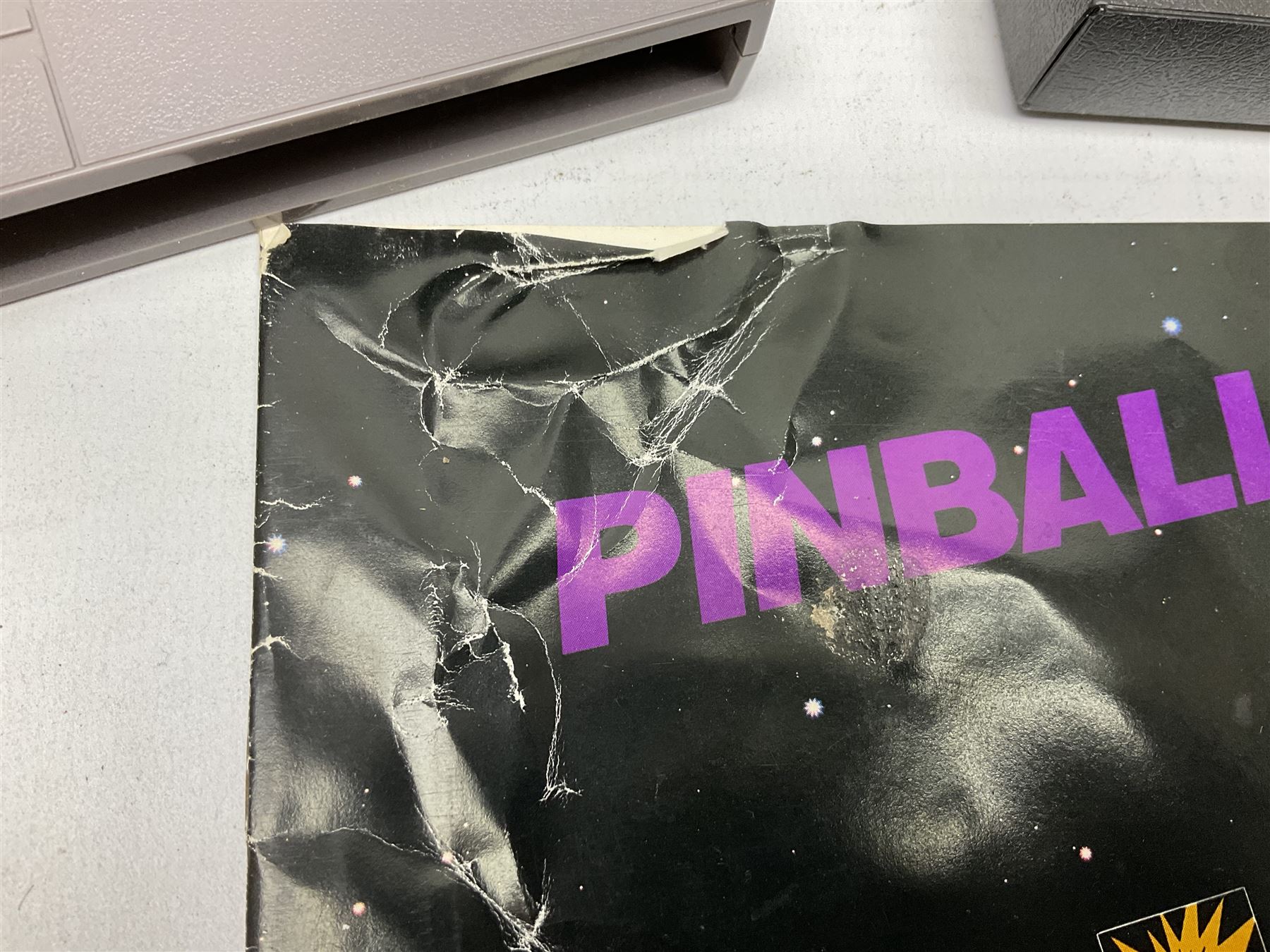 Nintendo Entertainment System (1985) console with two controllers, accessories and instruction booklet. NES Games ‘Duck Hunt’ with Nintendo Zapper gun, ‘Pinball’ and ‘Super Mario Bros.’, all with original sleeves and instruction booklets. NES game ‘Super Mario Bros. 2’ cartridge only