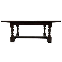 20th century oak refectory dining table, rectangular cleated top on turned supports joined by H-stretcher