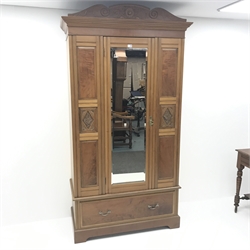  Edwardian bedroom suite comprising of mahogany raised mirror back dressing table, four drawers, turned supports joined by undertier (W107cm, H155cm, D54cm) a wardrobe with mirrored door above single drawer, shaped plinth base (W117cm, H207cm, D56cm) and chair (3)  