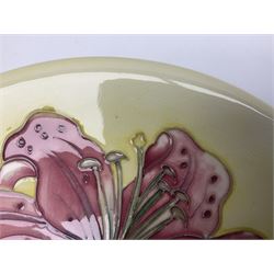 Moorcroft Tiger Lily pattern plate on a yellow ground, with painted and impressed mark beneath, D26cm