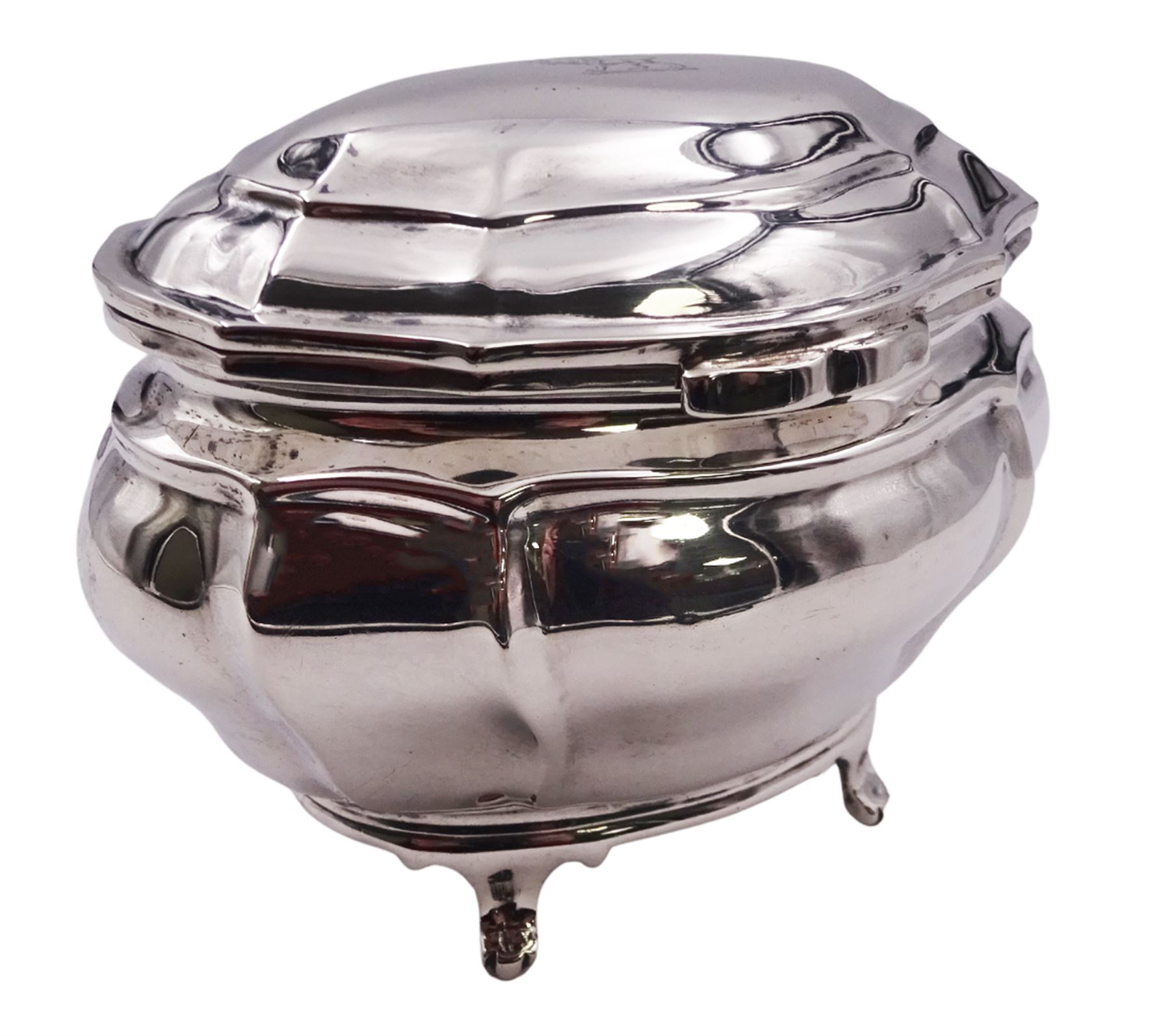 Edwardian silver tea caddy of bombe form, the hinged cover engraved with lion crest, upon four paw feet, hallmarked Goldsmiths & Silversmiths Co Ltd, London 1908, H8.5cm W10cm, approximate weight 5.25 ozt (163.2 grams)