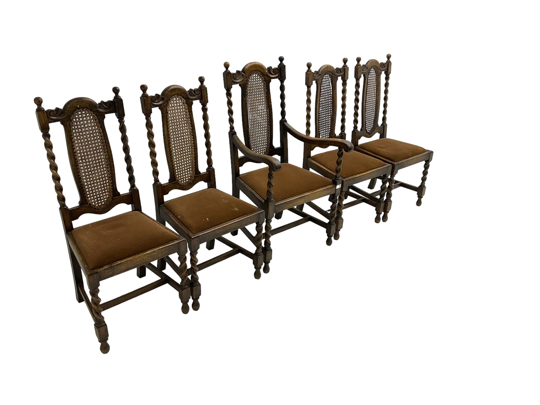 Set five early 20th oak barley twist dining chairs, spiral turned supports with oval cane-work backs, drop-in upholstered seats, on spiral turned supports joined by plain stretchers 