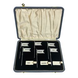 Cased set of six George V Amnora sandwich / canape flags in silver plated frames, with additional varied interchangeable celluloid labels, in original fitted blue box labelled 'Amnora England Reg. No. 742069'