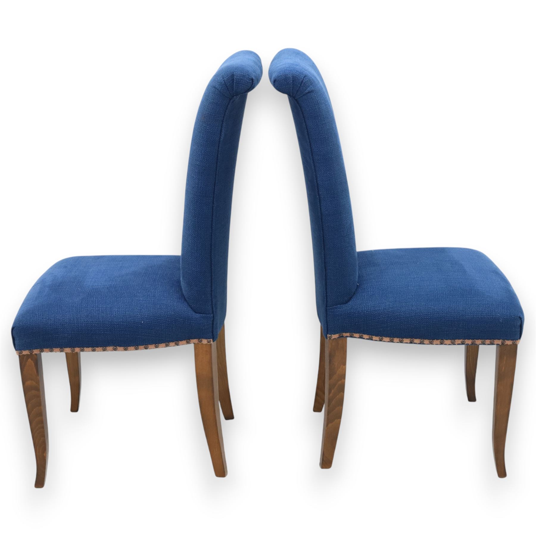 Contemporary set of four blue high back upholstered dining chairs