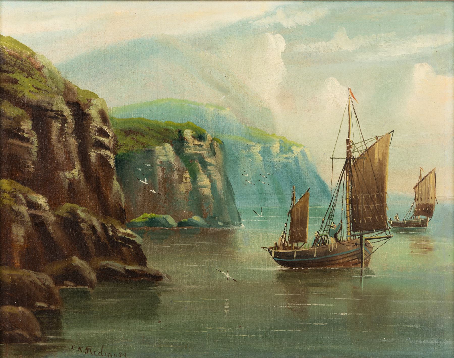 Edward King Redmore (British 1860-1941): Boats Sailing off a Rocky Coast, oil on canvas signed 37cm x 47cm