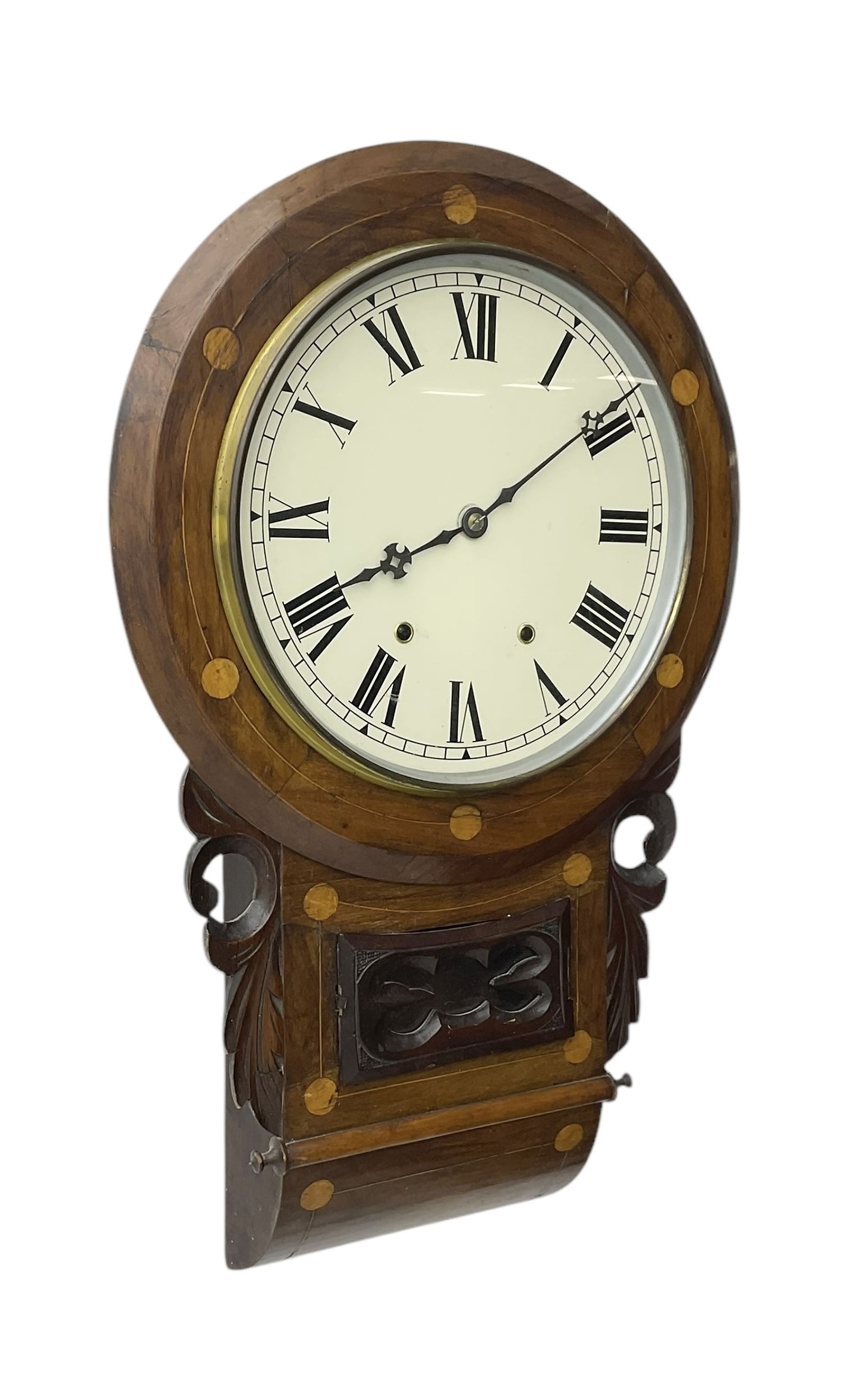 American- late 19th century 8-day mahogany drop dial wall clock, with a spun brass bezel and painted dial, Roman numerals, minute track and Maltese hands, case with an ogee base, satinwood inlay, carved case ears and a pendulum viewing door, twin train going barrel movement striking the hours on a bell. With pendulum. 