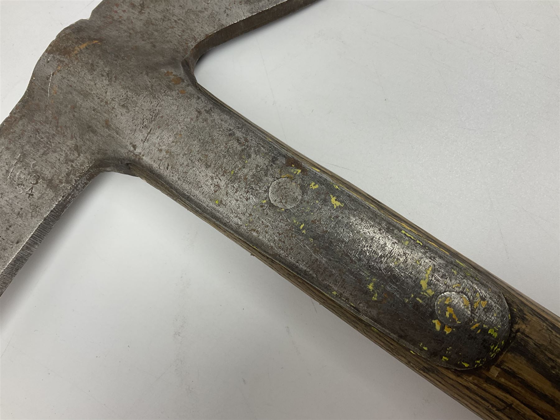 Post-War military type fireman's axe impressed 'PERKS 1953/54' with additional indistinct mark probably WD arrow, ash handle L39cm; and another stonemason's(?) double headed axe with mallet shaped shaft (2)