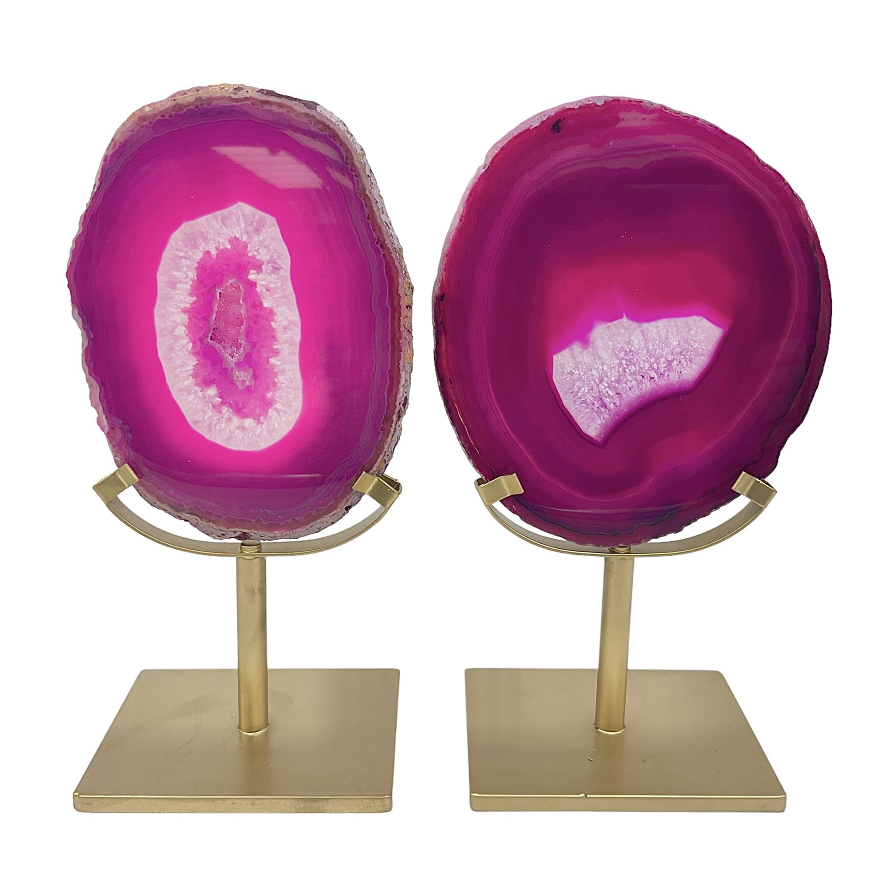 Pair of pink agate slices, polished with rough edges raised upon gilt metal stands, H20cm