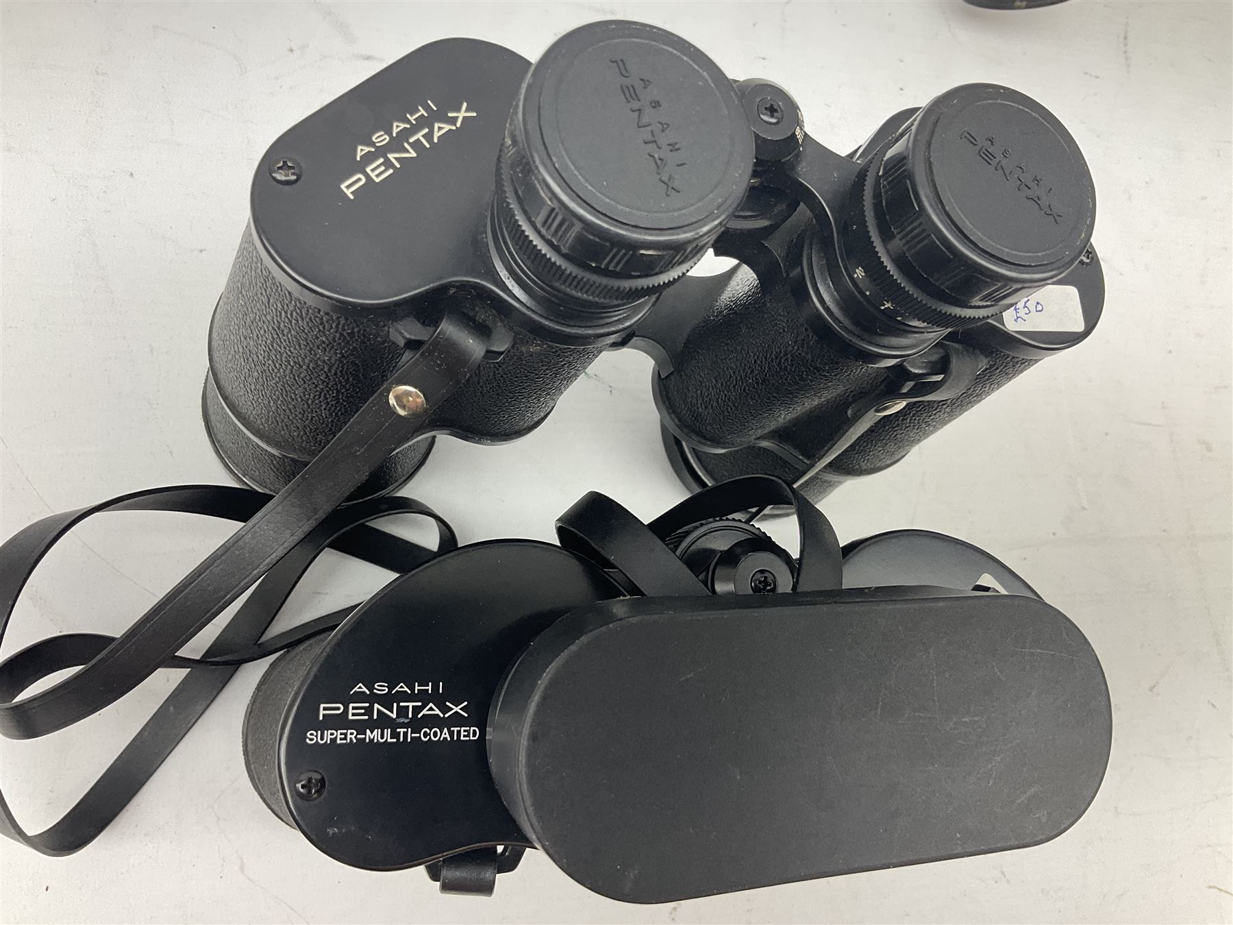 Six cased pairs of Pentax binoculars, comprising 10x50 Field, no. 604, Asahi 7x50, Asahi 10x50, Asahi 8x40, Asahi 16x50,  Asahi 10x50 No. 62611