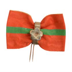 Collection of Japanese WWI and WWII badges and medals, including veteran badges 