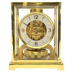 Jaeger-LeCoultre Atmos timepiece clock, in gilt brass and glass case, with wall mount, serial number - 444966