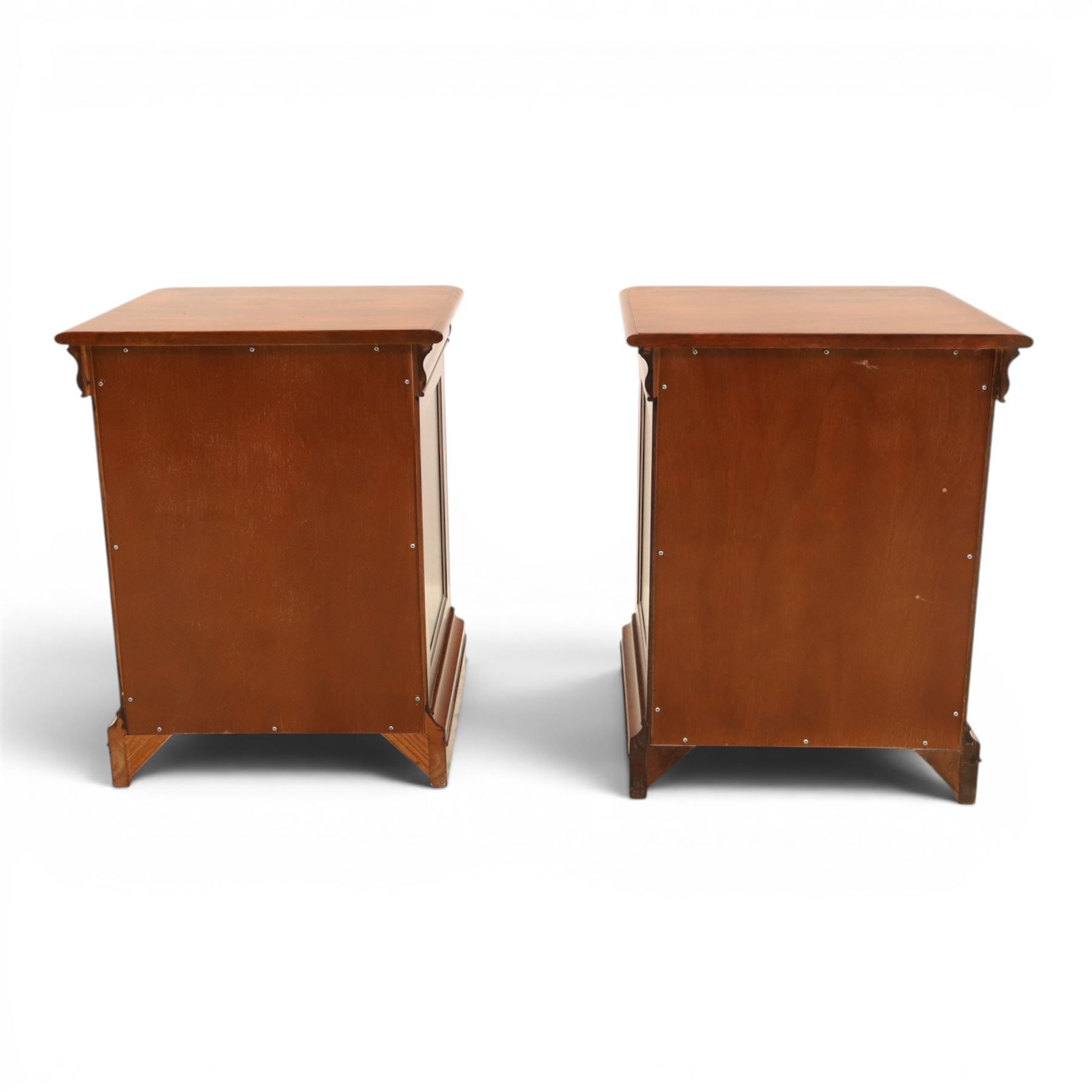 Willis & Gambier - mahogany pair of bedside cabinets, with frieze drawer with blue baize lined interior, panelled sides and three drawers raised on bracket feet