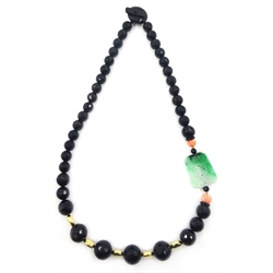  Carved jade, coral, black onyx and 18ct gold necklace   