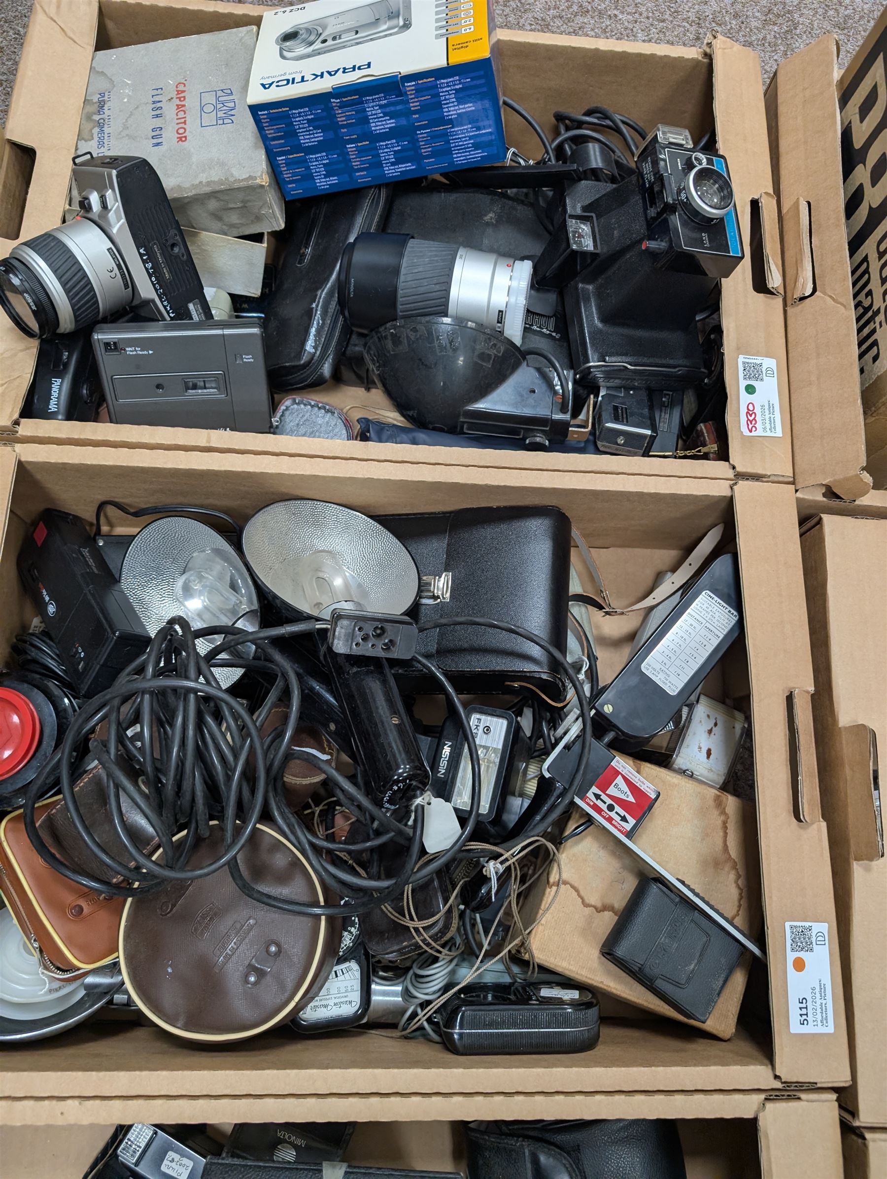 Collection of vintage cameras, projectors and accessories, including Kodak Brownies, Praktica, Polaroid, Ensign, light meters, flashes, etc