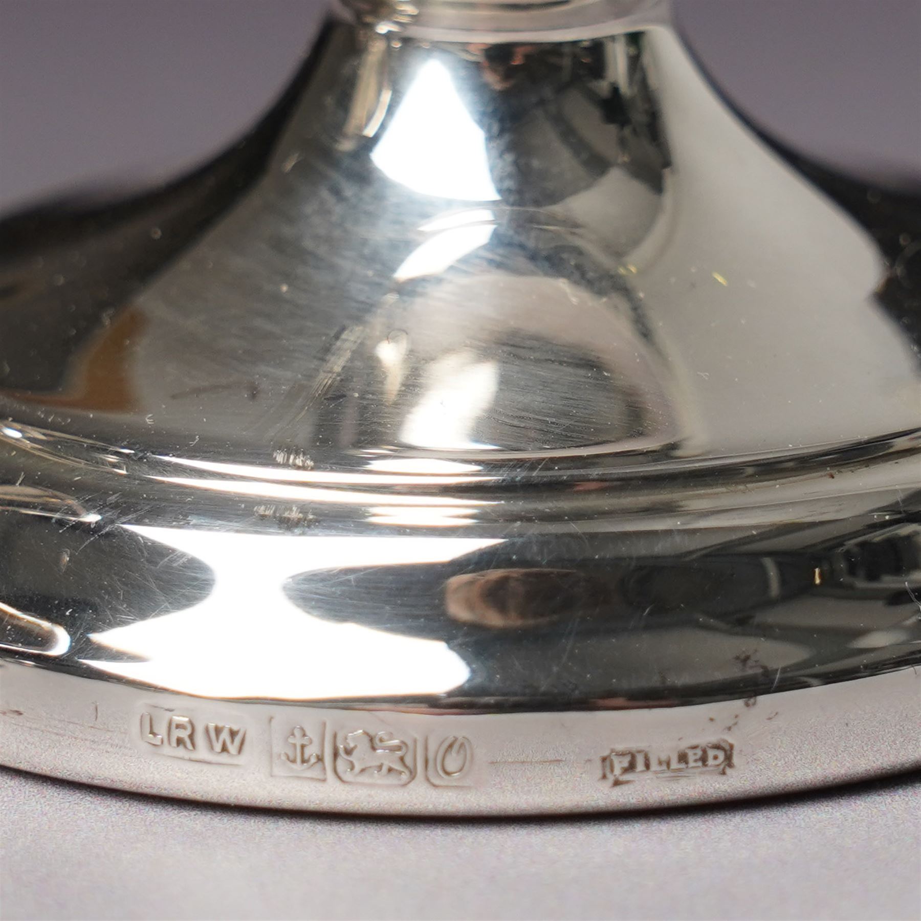 Georgian design silver cream jug Birmingham 1901 Maker George Unite, three piece silver condiment set Birmingham 1940, pair of small silver dressing table candlesticks and three condiment spoons