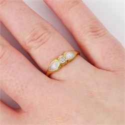 Early 20th century gold opal and diamond three stone ring, single old cut diamond of approx 0.10 carat, with a single cabochon pear cut opal set either side