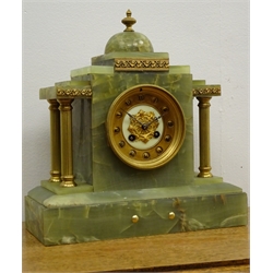 20th century green onyx mantel clock, temple shaped case with brass columns, gilt Roman dial inscribed Reid & Sons Paris, twin train movement striking the half hours on a bell, H33cm  