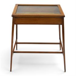 Edwardian inlaid mahogany bijouterie table of elegant proportions, rectangular hinged glazed top with mahogany banding, raised on splayed square tapering supports united by double-H stretcher