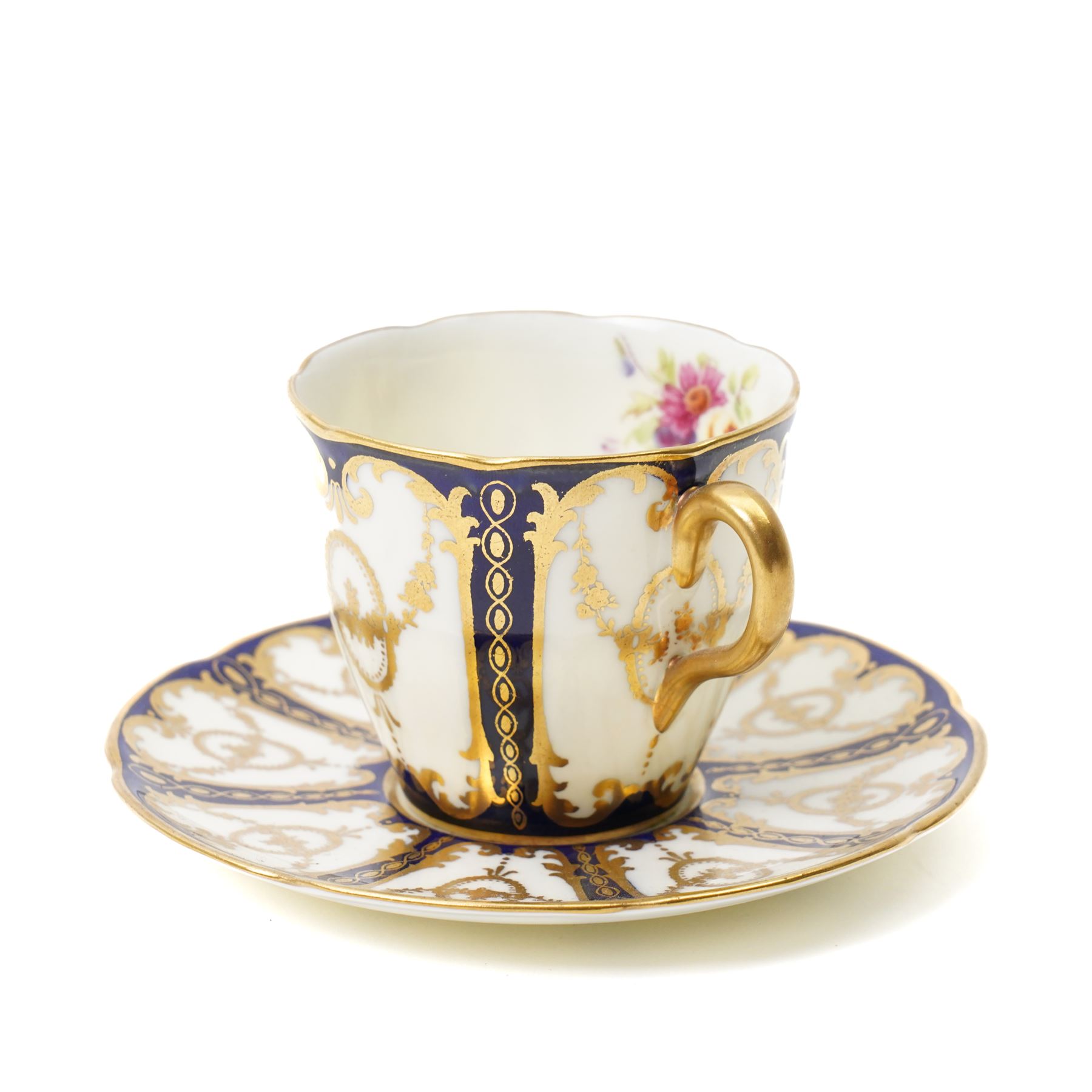 Grainger Lee & Co Worcester teacup, together with a collection of cobalt blue cabinet cups and saucers,  including a Royal Doulton hand-painted example by E Percy, and various others 19th century and later, mostly unmarked (7 pairs)