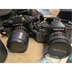 Contax SLR camera with a Yashica ML Zoom 42-75mm 1:3.5-4.5 lens, in case with accessories, together with a Yashica FX-D Quartz SLR camera with a Carl Zeiss Planar 1.7/50 lens, with filters, instruction booklets and other accessories