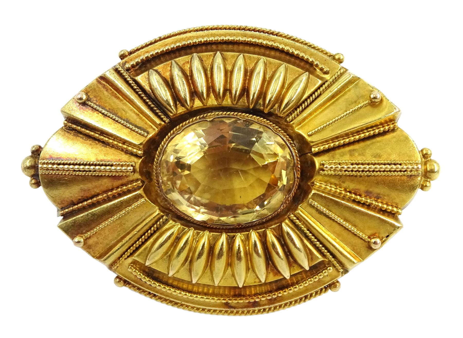 Victorian Etruscan revival gold brooch set with an oval citrine