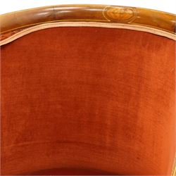 Pair of Edwardian inlaid mahogany tub armchairs, traditional shape with satinwood stringing, upholstered in crimson fabric with sprung seat, on square tapering supports with castors