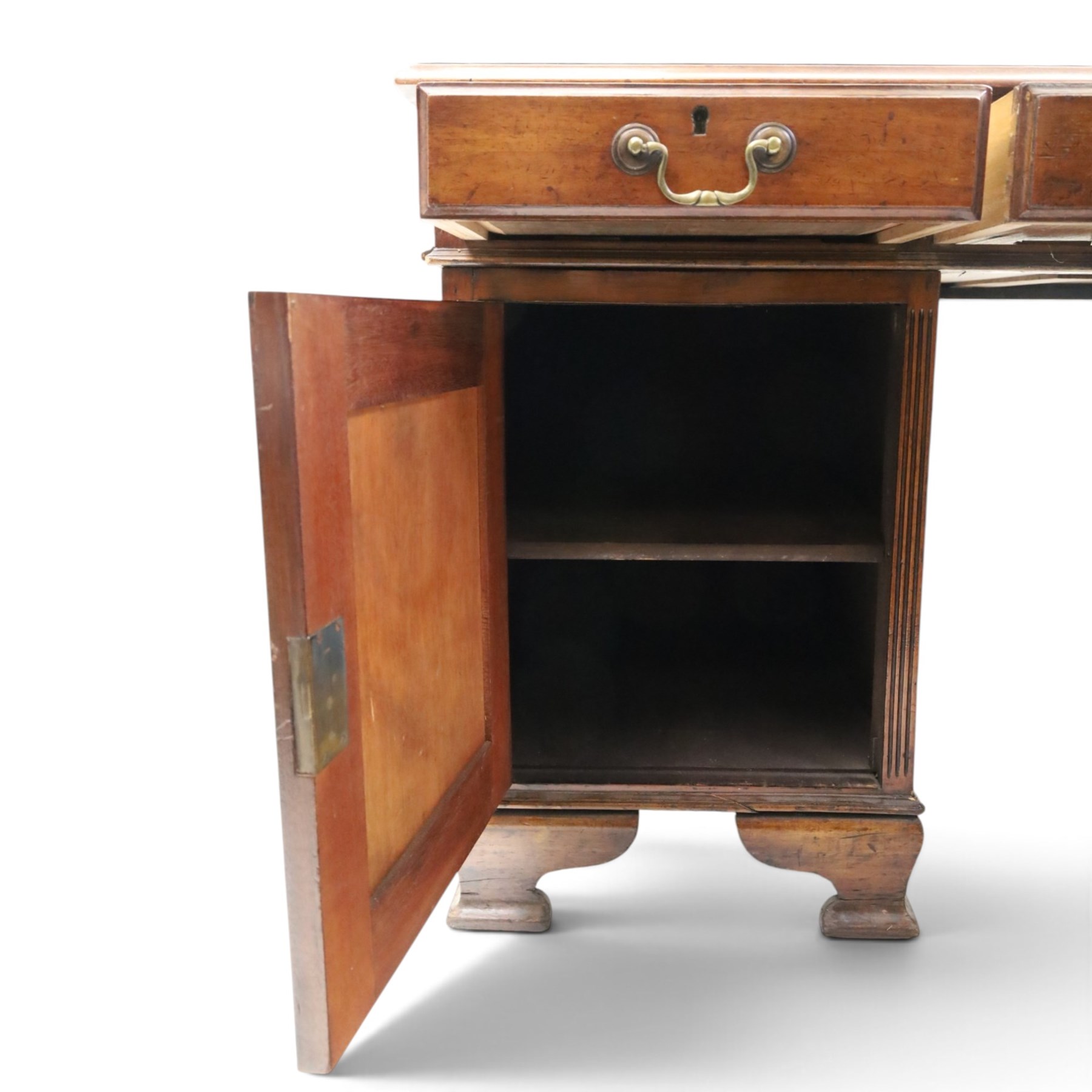 D Matthews & Son Office Furnishers (Liverpool) - Edwardian mahogany twin pedestal partners desk, rectangular top with inset green leather writing surface, fitted with an assortment of twelve drawers with brass swan neck handles, the pedestals with cupboards fitted to the opposing side, raised on ogee bracket feet